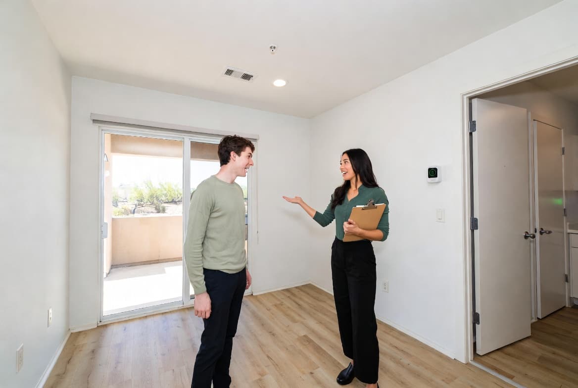 Property manager showing a clean, odor-free rental unit after professional cannabis odor removal